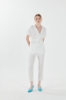Picture of Woman Ecru V Neck Blouse Trousers Aerobin Suit